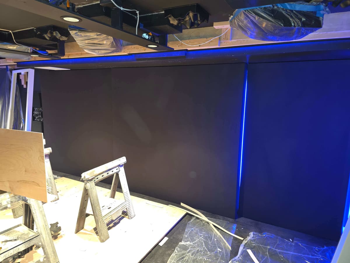 In-wall or in-ceiling speakers installed for surround sound